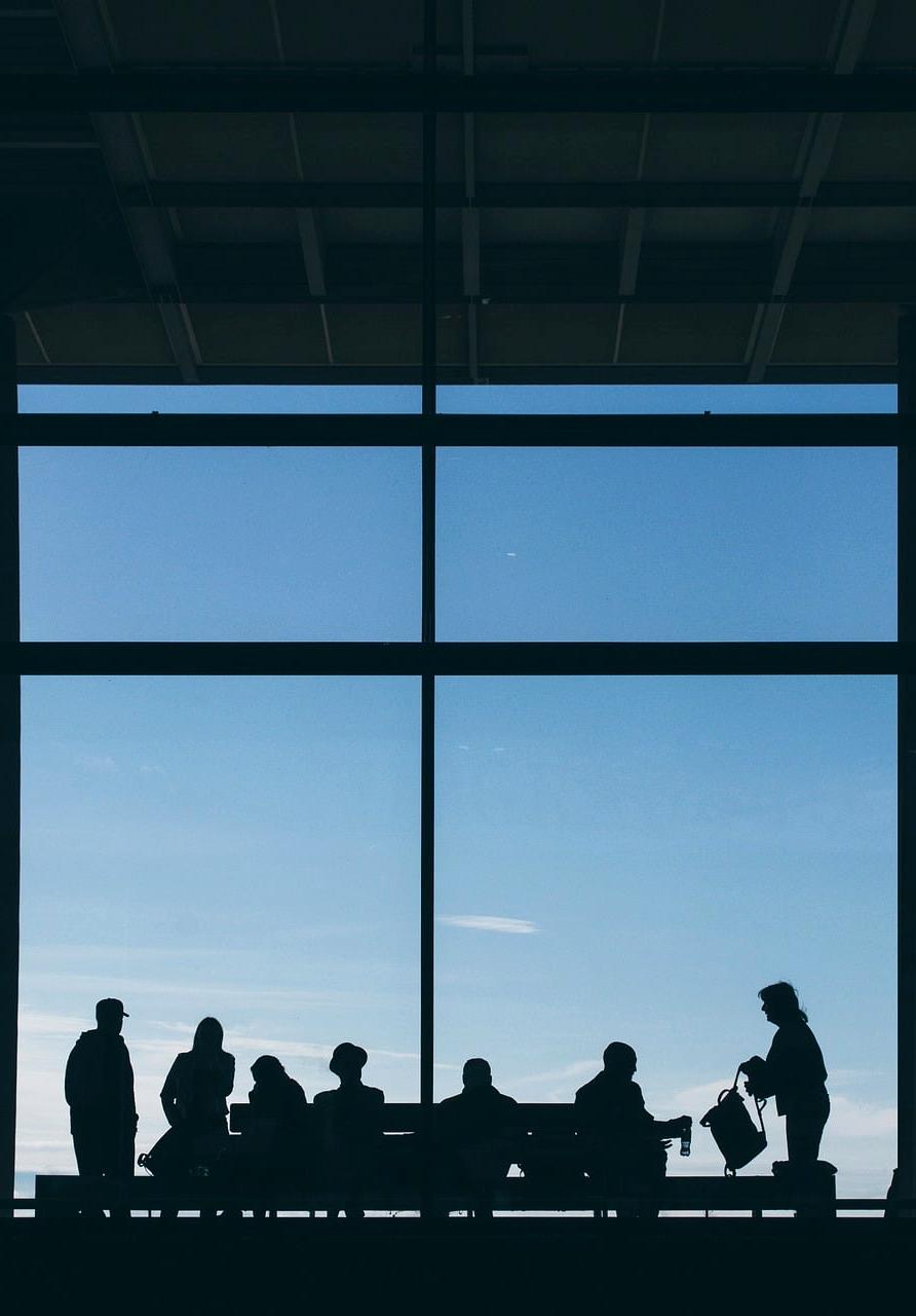 Passengers relaxing in an elegant airport lounge