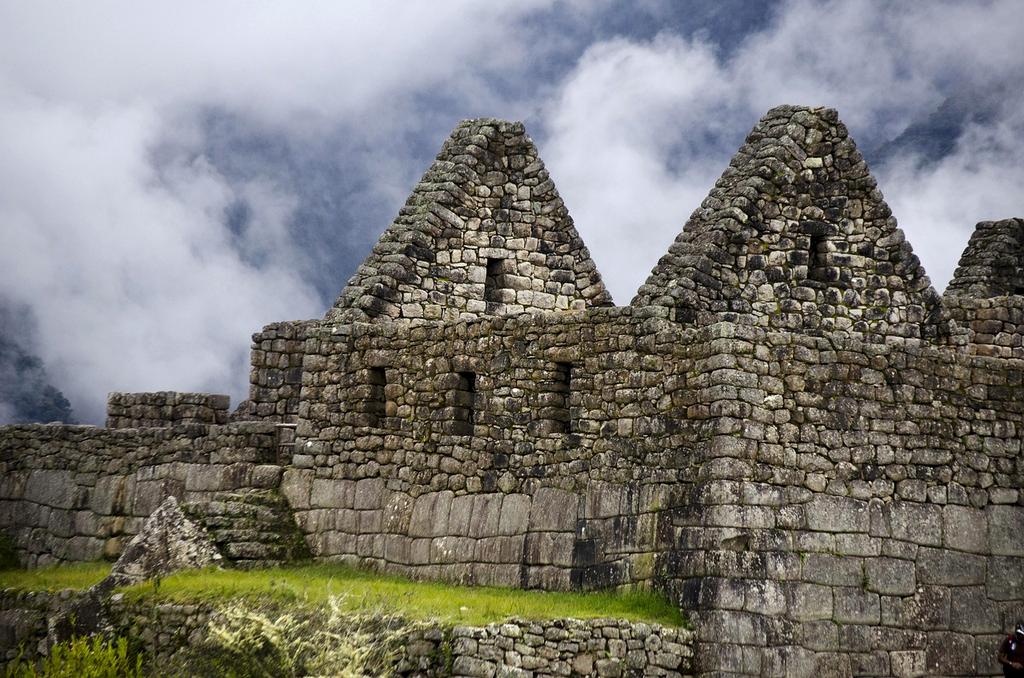 Machu Picchu ancient Incan citadel ruins set against a mountain backdrop