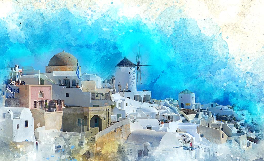 Santorini island with white buildings and blue domes overlooking the Aegean Sea